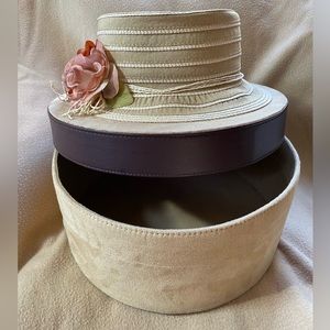 Nice ladies Easter hat with suede hat box. One size. Very light airy hat.